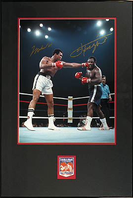 Color photo of Muhammad Ali and Joe Frazier, The Thrilla in Manila